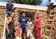 Voluntari care reconstruiesc o casă în Gorj, înjurați de localnici